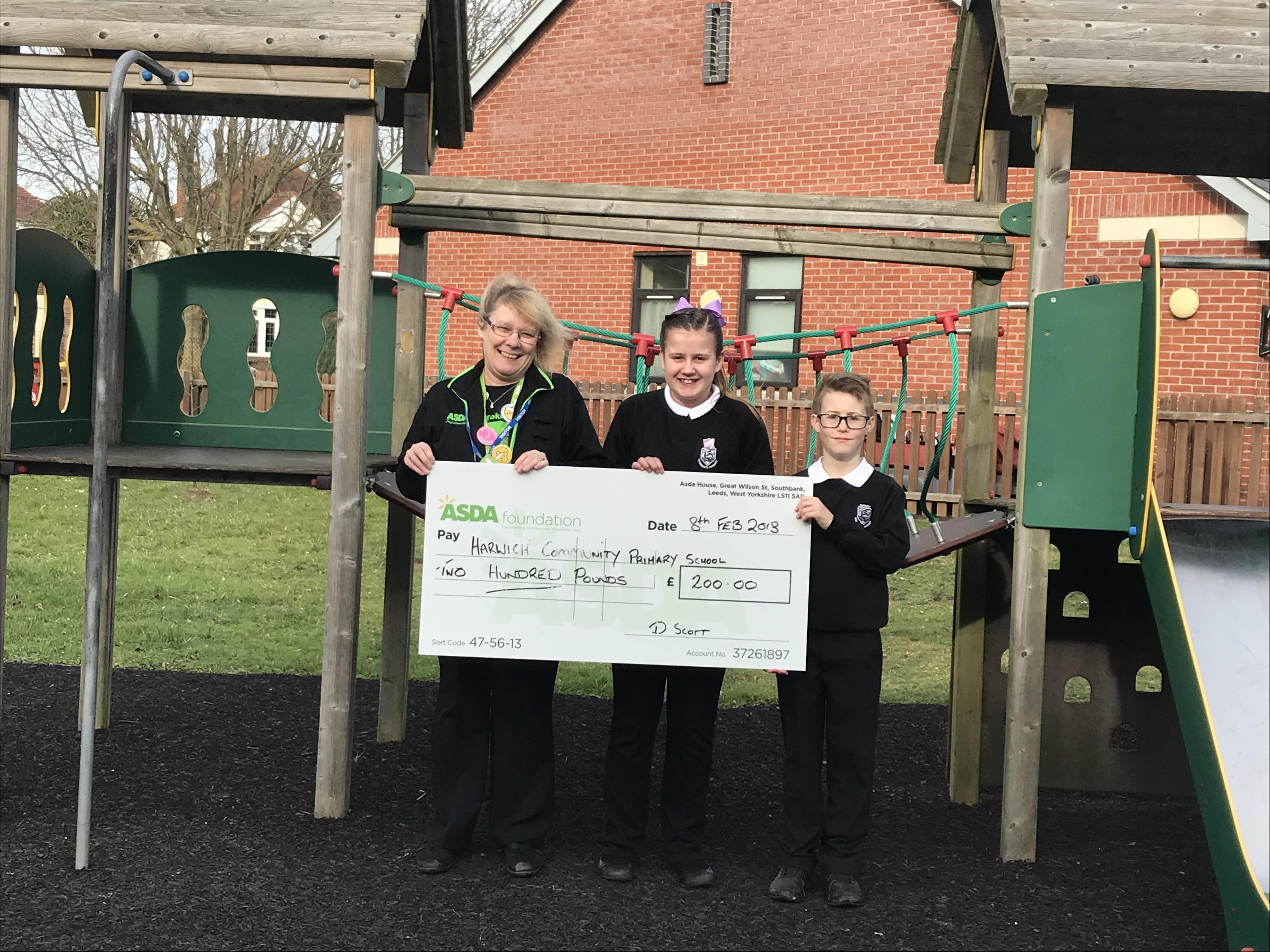 Receiving our cheque for &pound;200 