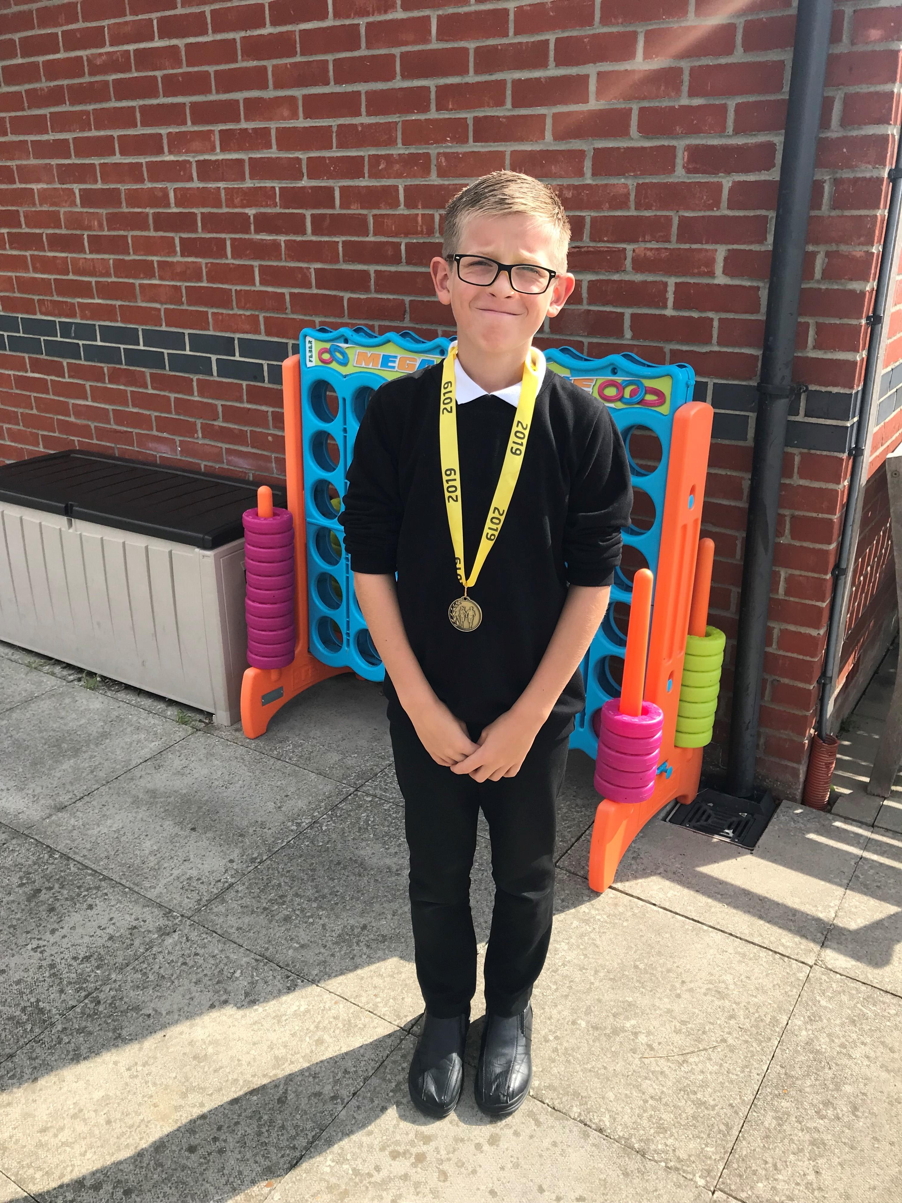 Finley acheived this medal for 3K Dedham run!!