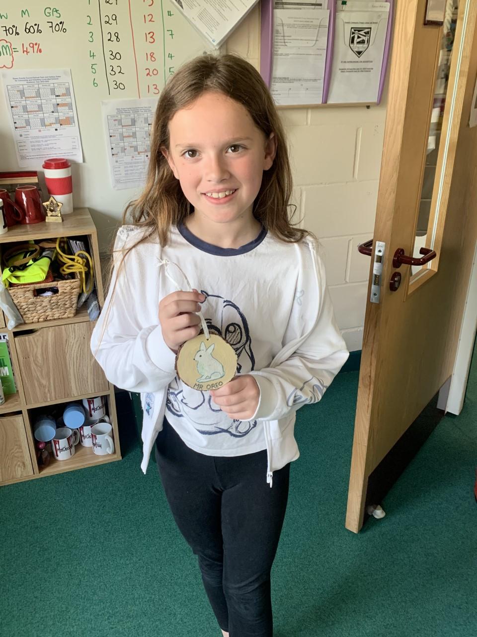 Izzy used her handy skills to make this home plaque for Mr Oreo's Palace!