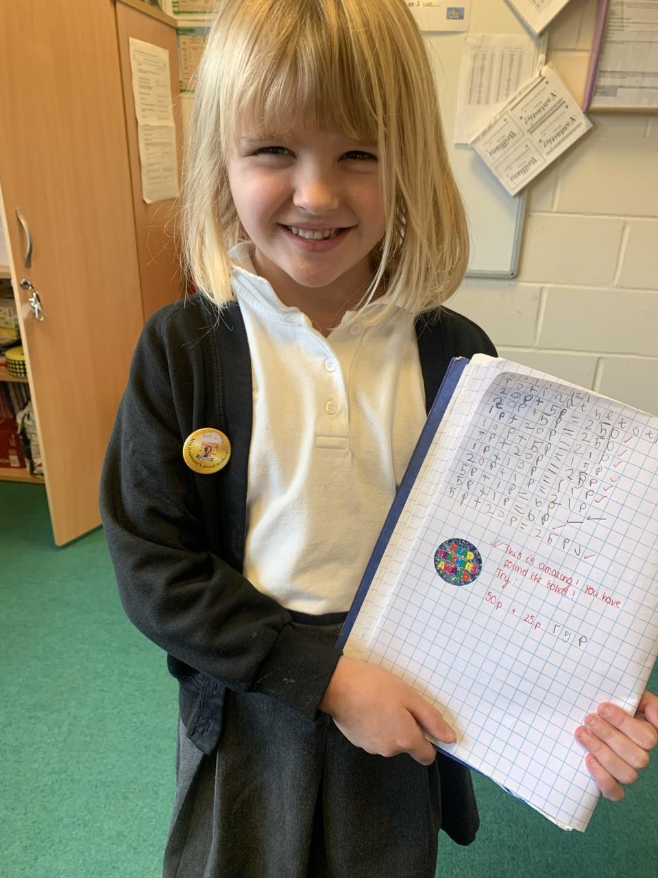 Amazing Maths work set out beautifully and all correct too!